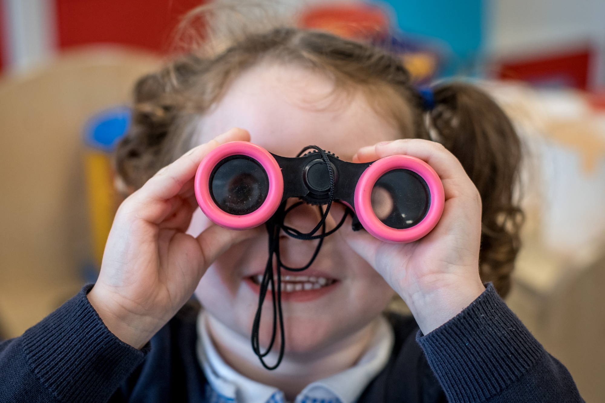 Child with binoculars